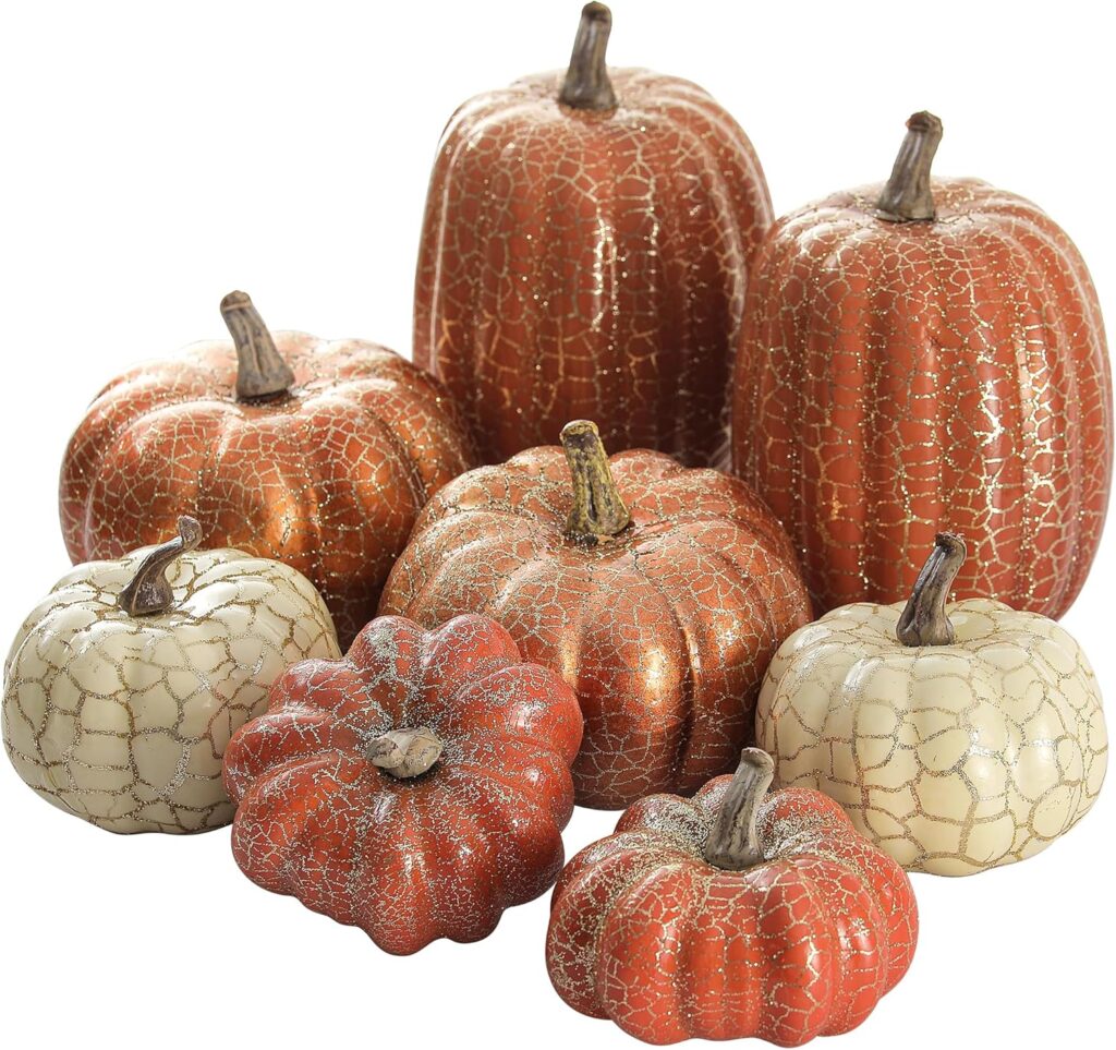 Thanksgiving table with faux pumpkins and greenery